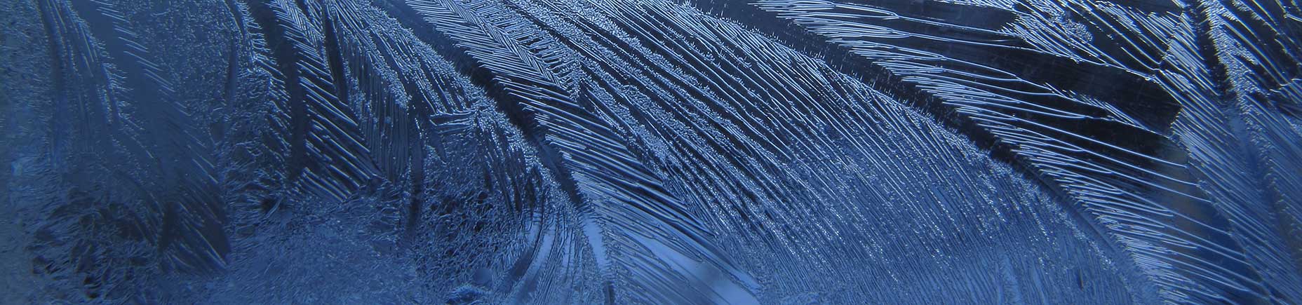 frost-on-window-blue-background